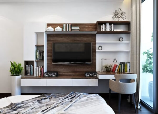 Sử dụng kết hợp kệ tivi và bàn làm việc khi trang trí phòng ngủ nhỏ.